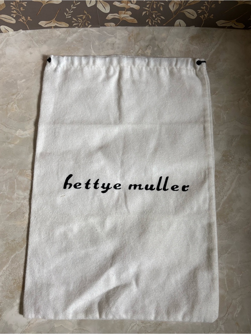 Bettye Muller white shoe dust bag